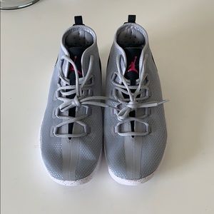 Grey and Black Jordan’s with Pink Logo